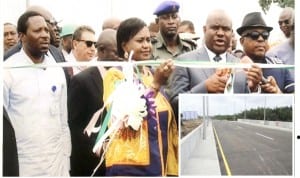 Rivers State Governor, Chief Nyesom Wike (2nd right),officially cutting the tape to commission the first phase of Nkpogu Road/bridge, yesterday. With him are, his Deputy, Dr Ipalibo Harry-Banigo (2nd left),Deputy National Chairman, Peoples Democratic Party, Chief Uche Secondus (right) and Commissioner for Information and Communications, Dr Austine Tam-George. Inset is the reconstructed Nkpogu bridge.