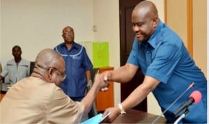 Rivers State Governor, Chief Nyesom Wike (right), receiving a document from the President, Ogbakor Ikwerre, United States and Canada branch, Mr Fortune Woluwo, during the courtesy visit  of the delegation to the Governor in Port Harcourt, recently.