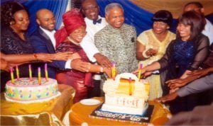 Pro-Chancellor/Chairman University of Nigeria Nsukka (UNN), Emmanuel C. Ukala SAN (centre) cutting his 60th birthday cake. Wife of the Governor of Rivers State, Justice Mrs Suzzete Wike (3rd right), Dr (Mrs) Kate Ukala (3rd left), Chief  Ifeatu John Areh,  Regional Eck Spiritual Aide (RESA) Eckankar Nigeria (4 left), Justice Okocha (rtd) and his childrens during the celebration at Le Meridien Hotel Port Harcourt last Saturday.         Photo: Chris Monayanaga.