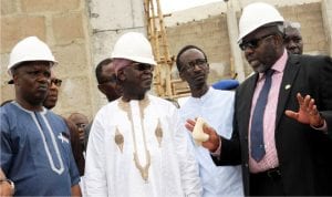 L-R: Member, House Committee on Industries, Mr Emmanuel Akpan, Chairman of the Committee, Alhaji Abubakar Moriki, Managing Director, Hortigraph Nigeria Limited, Alhaji Murtala Abubakar and Acting Director-General, Standards Organisation of Nigeria (SON), Dr Paul Angga, during an inspection tour of National Meteorology Institute in Enugu on Monday.